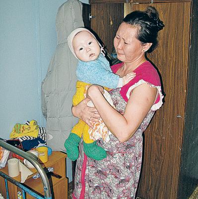 Жена Виктора Комарова Лада с сыном Ильей